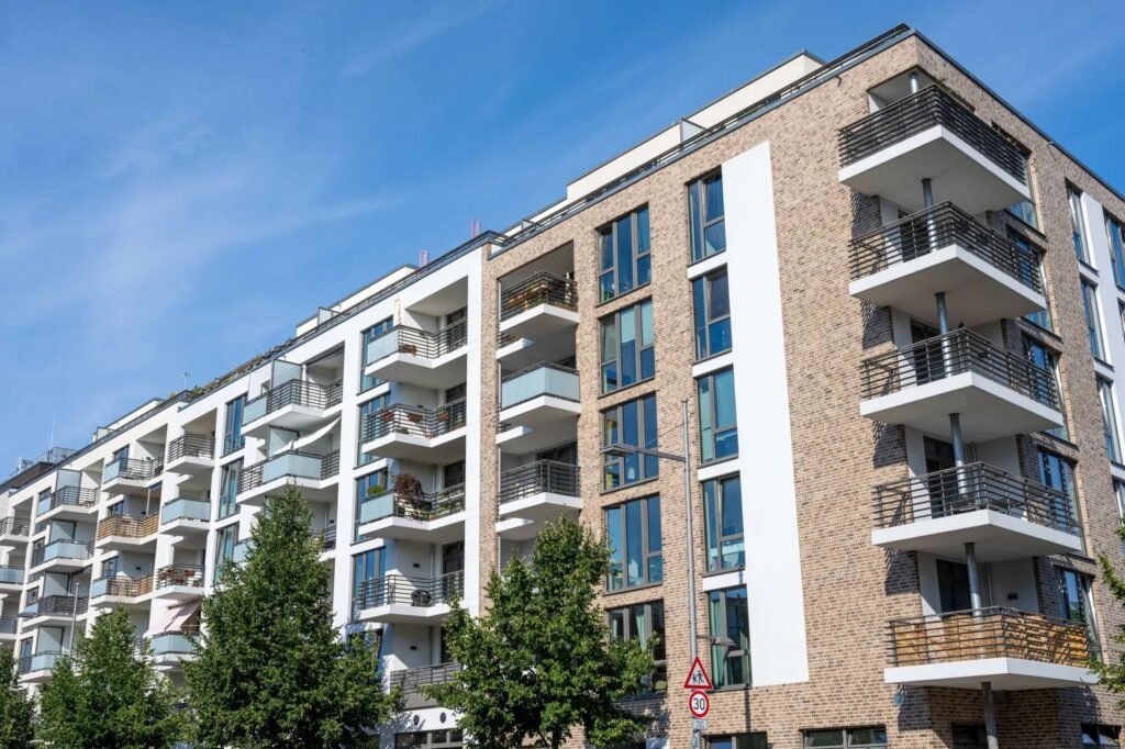 Apartment complex representing vendor management software benefits like compliance tracking and contract renewal alerts.