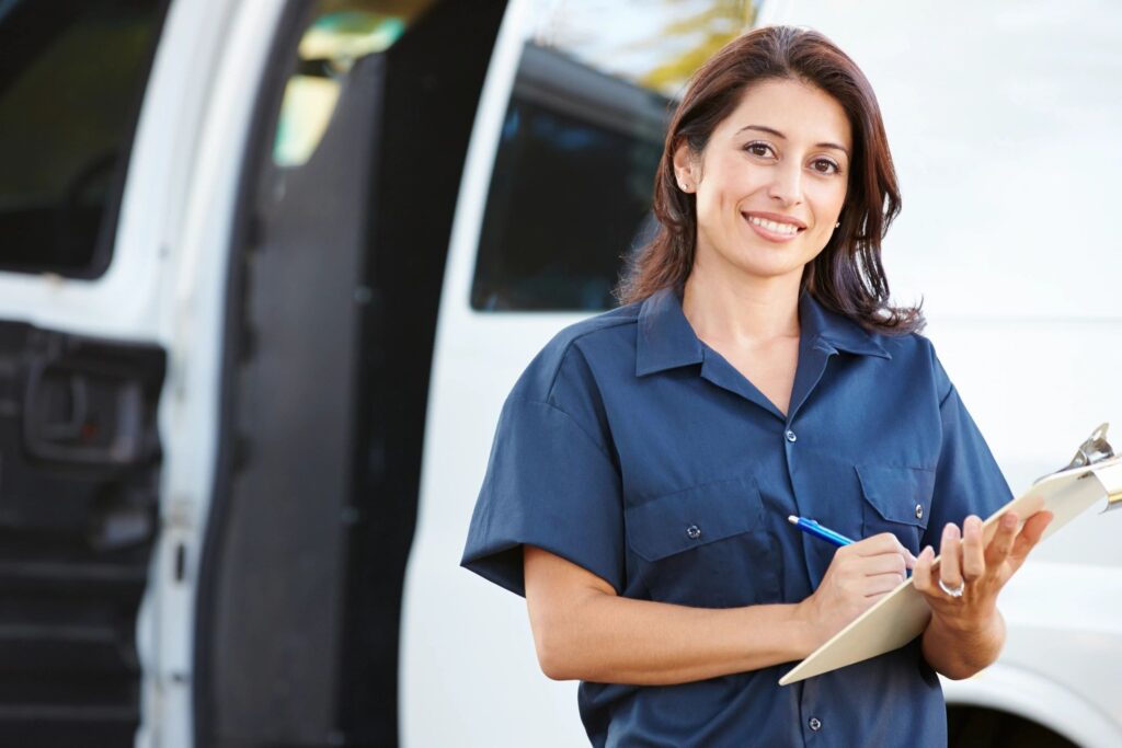 Woman in uniform for supplier contract tracking software for uniform service