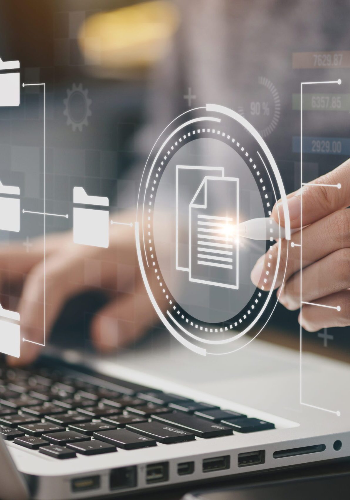 Hands typing on a laptop with digital document graphic representing Supplier Agreement Management